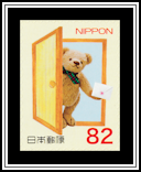 Beige Bear in a Yellow Door