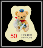 Posukuma Holding a Blue Bouquet